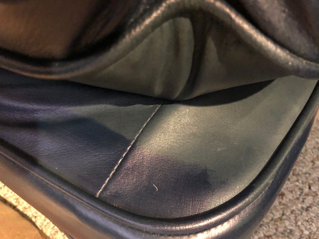 Unseen area of leather restoration coloring