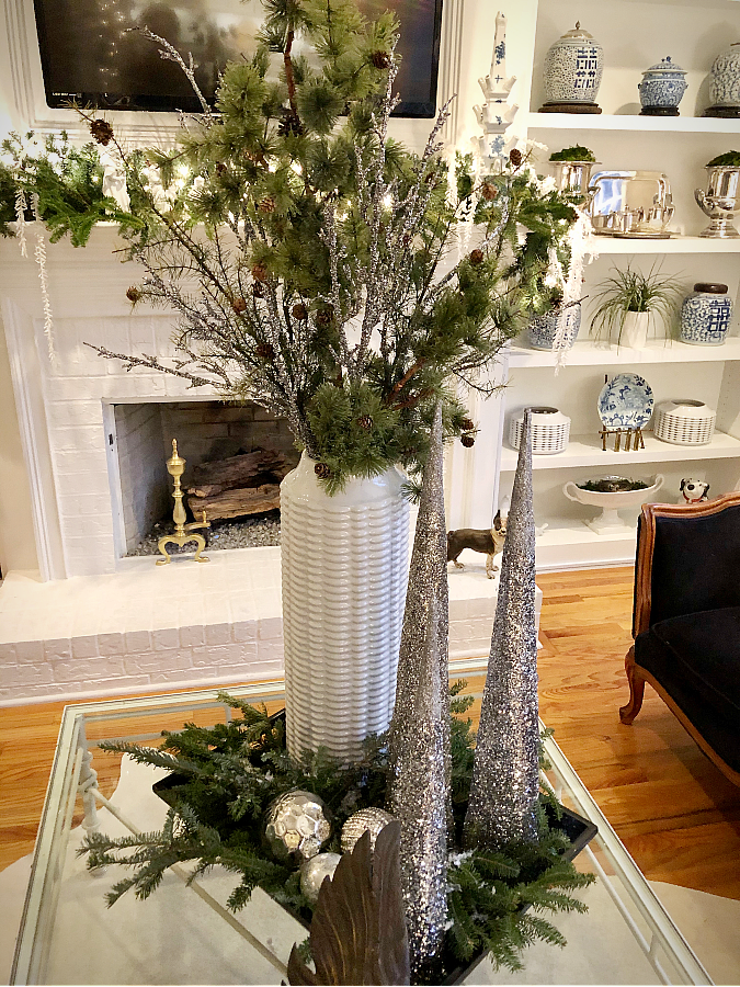Christmas decor. Tray with glittery cones, pine stems, chinoiserie, and mercury glass.