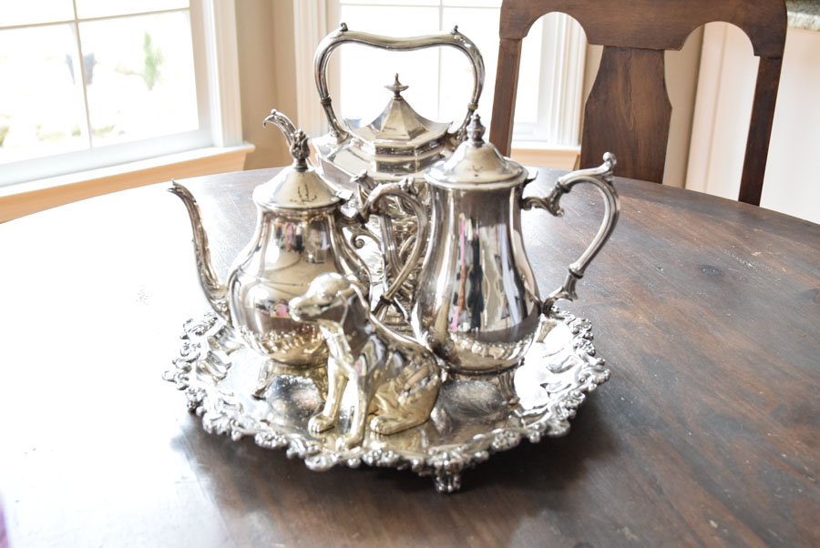 Silver tea set on kitchen table